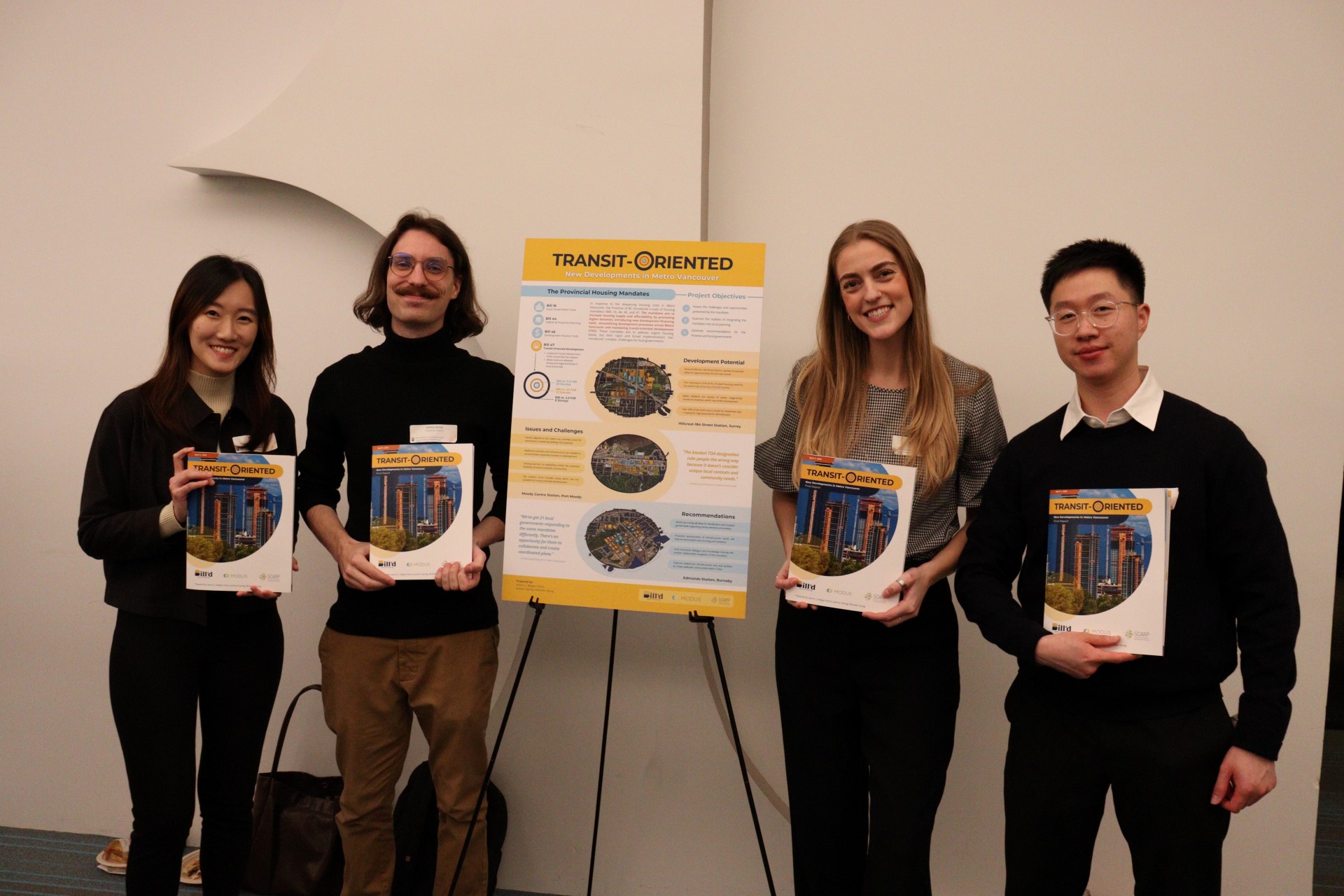 Students presenting their project poster