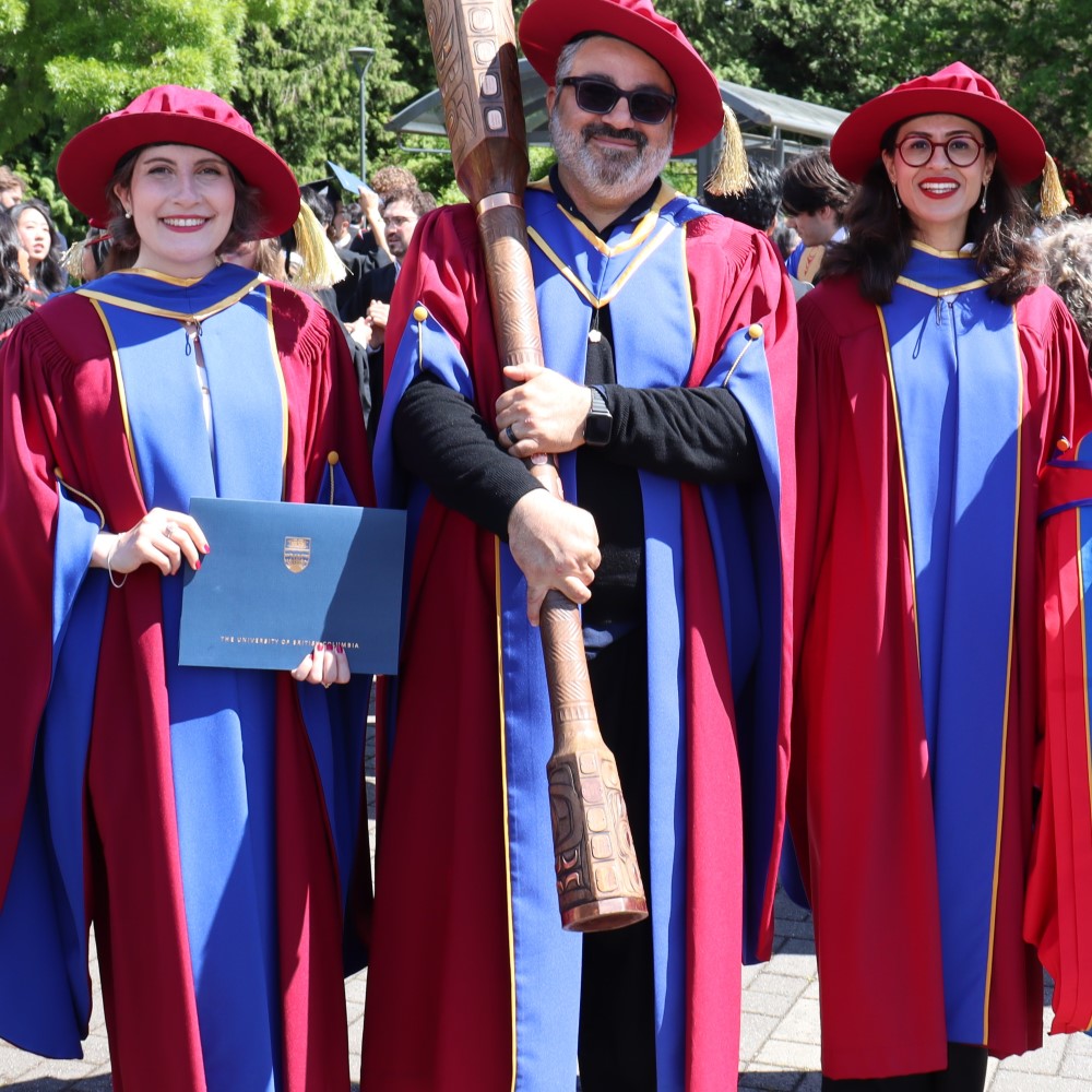 People in PhD regalia