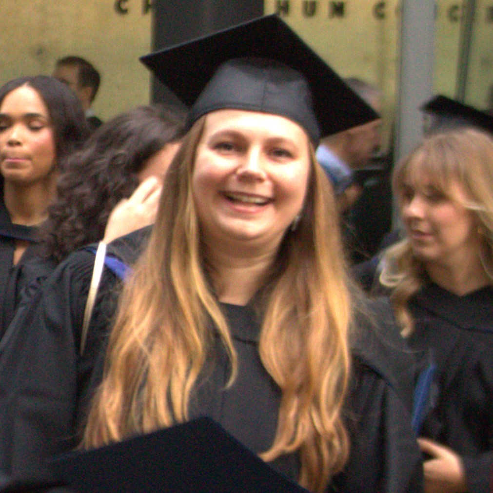 Woman in grad regalia