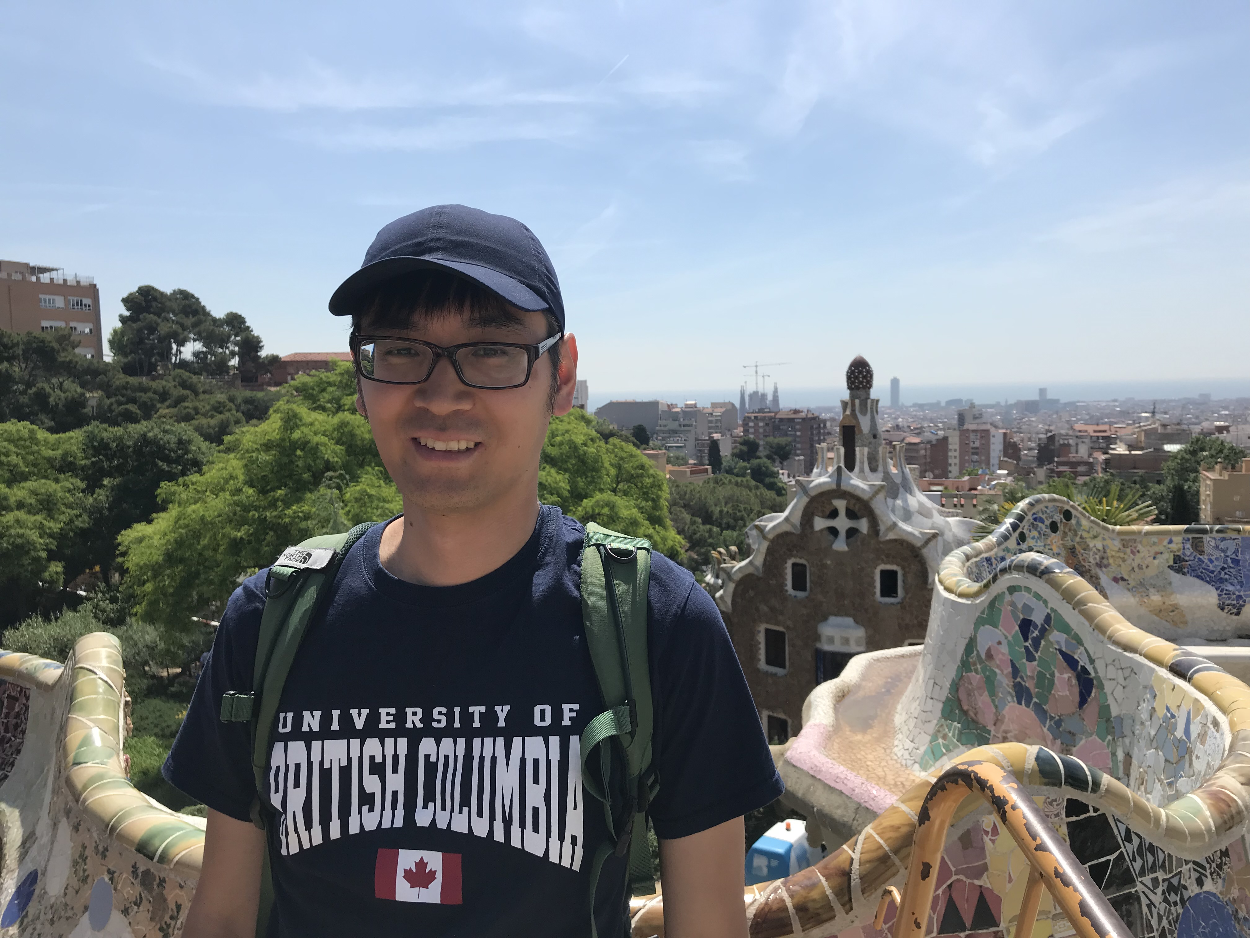 Tadayori on rooftop among Barcelona cityscape