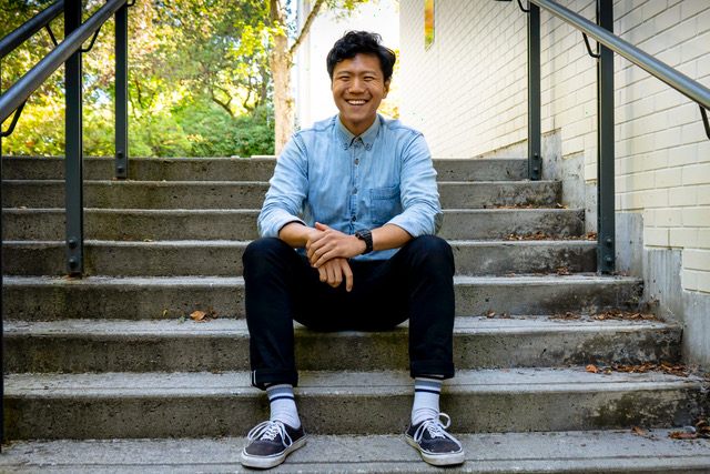 Man sitting on urban staircase