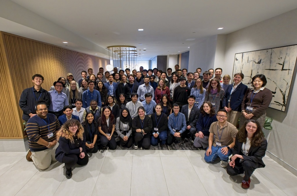Large group of youth in conference hall lobby