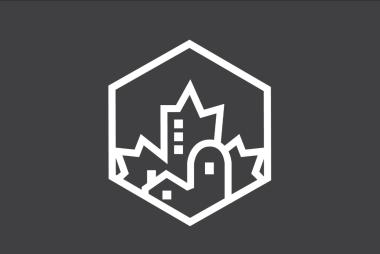 Logo of a cityscape shaped like a maple leaf