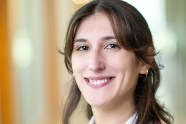 Woman in white buttoned-up shirt