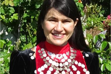 Dr. Yumagulova, among flowering bushes