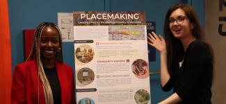 Students presenting their project poster