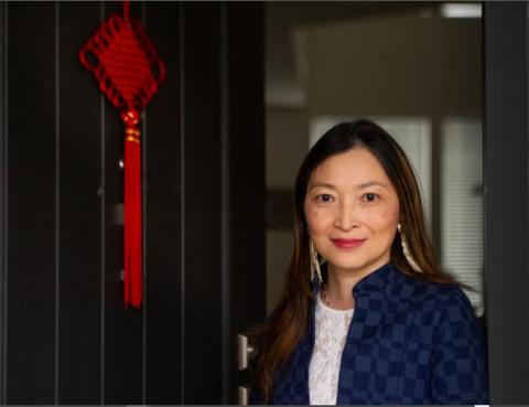 Louisa-May, beside traditional hanging art