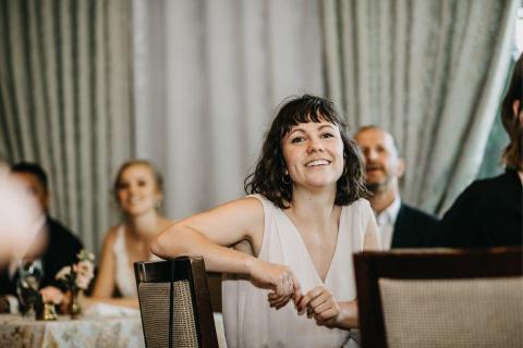 Tracy, sitting at gala audience table