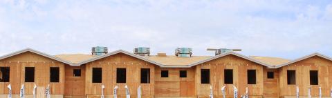 Row of buildings under construction