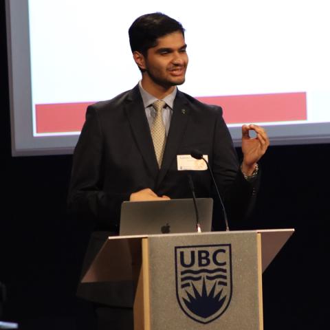 Man at UBC lectern