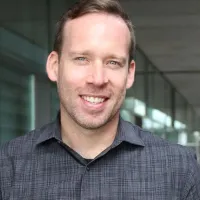 James, outside building