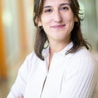 Woman smiling with arms crossed