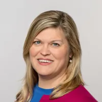 Kelly, in red cardigan