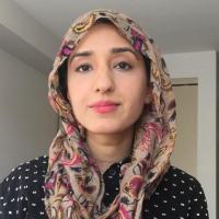 Khajida, in polkadot shirt and hijab
