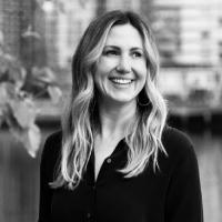 A woman in a black shirt, in monochrome