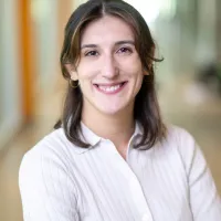 Woman in white button-up shirt