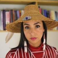 Woman in broad woven hat