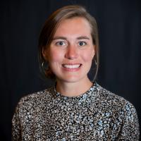 Woman in polkadotted silver top